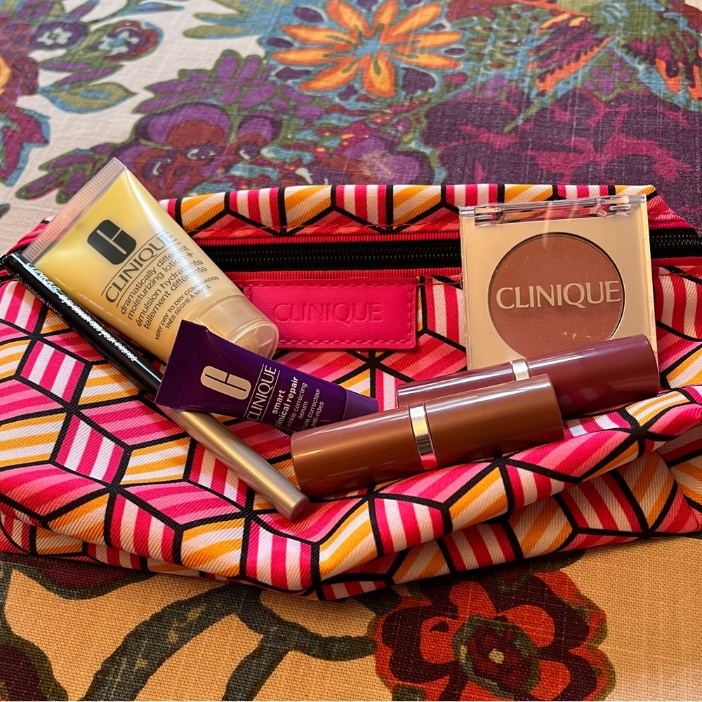 Clinique Beauty Bundle with Vibrant Pink and Orange Bag